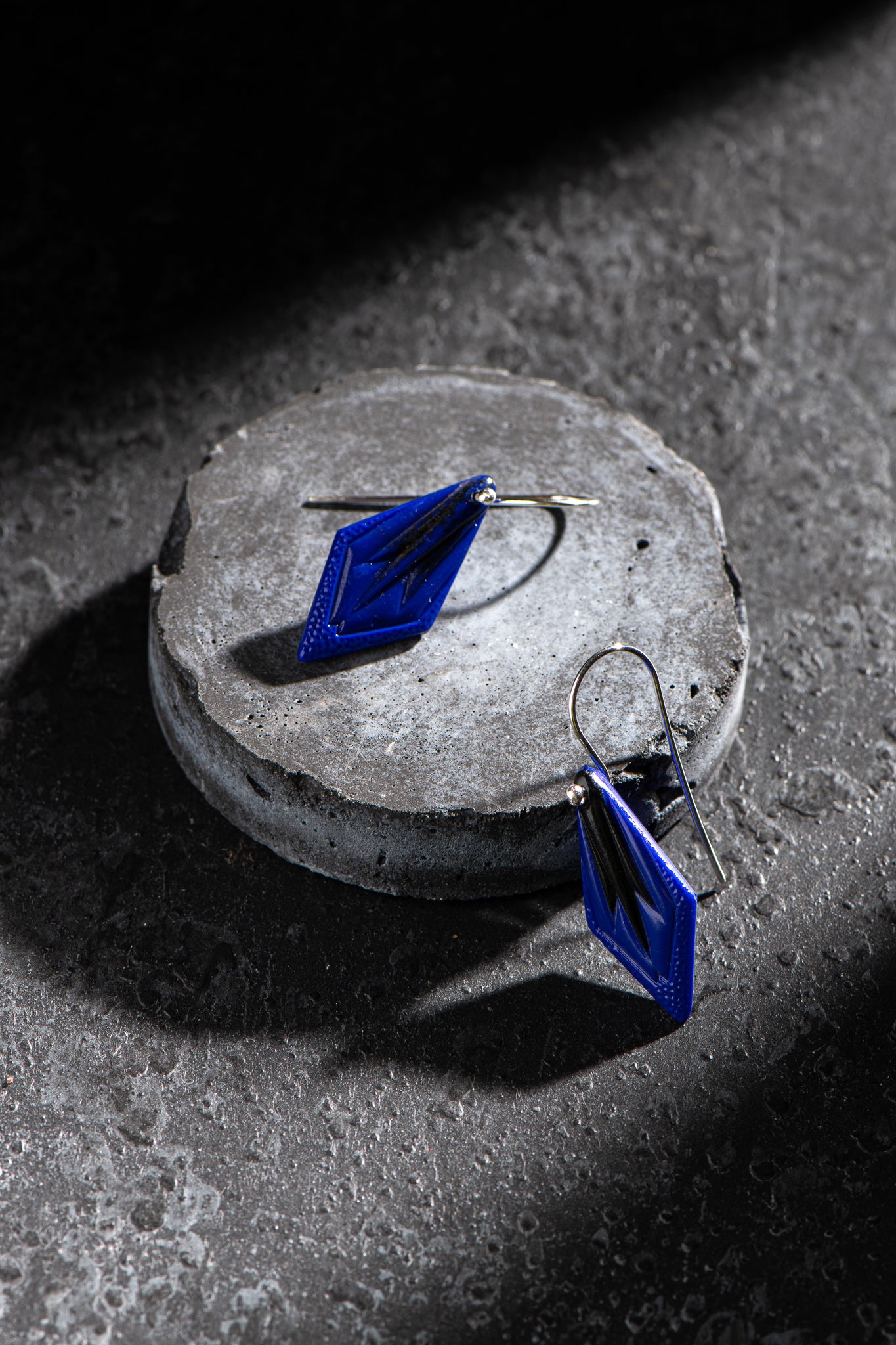 Royal blue store and black earrings