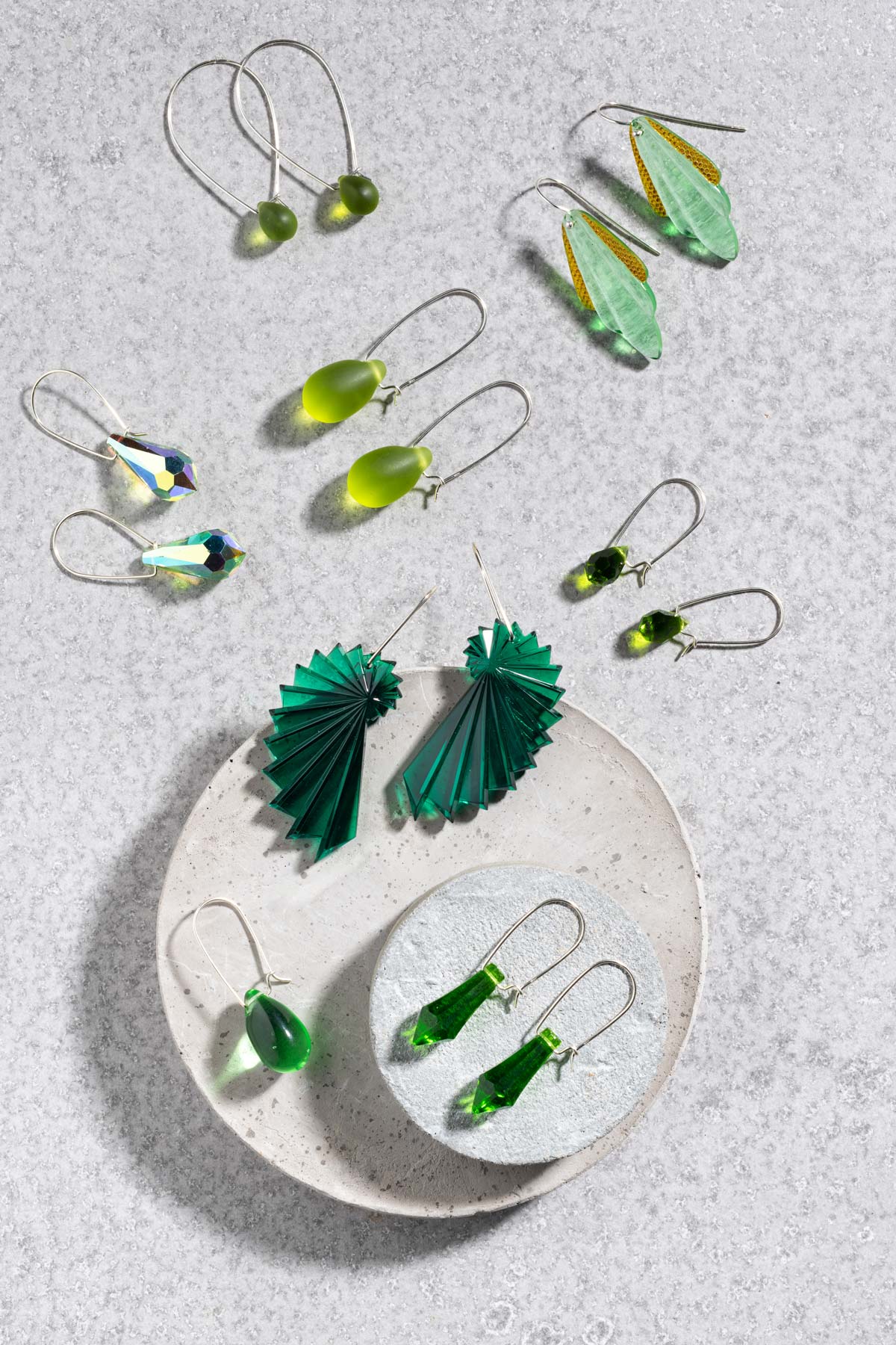 Flat lay of earrings from Betsy Blonde featuring green colours